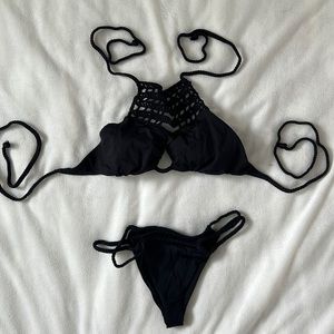 Frankie’s Bikinis - detailed halter top and skimpy strapped bottom